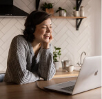 woman looking in laptop